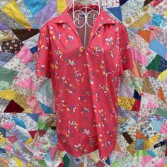 "1970s collared short sleeve button up shirt.  Bright pink color, collared neckline, and a pull over with no closure. Best fit a S-M, but please see the measurements to ensure a perfect fit. Material, and original size are unknown and brand is Lewmar Creations. Freshly laundered. Here to help if you have any questions. chest 20.5\"  length 24\" #pink #70s #polyester #vintage #pink" Pink Floral Print Collared Blouse, Vintage V-neck Shirt For Summer, Vintage V-neck Summer Shirt, Summer Collared Tops With Retro Print, Printed Pink Camp Shirt For Spring, Pink Cotton Short Sleeve Camp Shirt, Vintage Short Sleeve Blouse With Retro Print, Retro Pink Top With Retro Print, Short Sleeve Pink Blouse With Floral Print