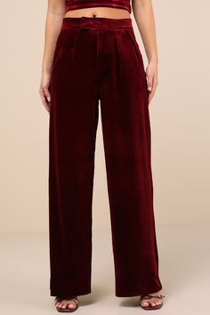 The perfect look for a holiday party includes the Blank NYC Sneak Peak Burgundy Velvet High-Rise Trouser Pants! Luxe velvet shapes these sensational pants with a high-rise fit and a stitched waistband with dual, hidden snap button closures atop a hidden zip fly. The straight pant legs feature pleated details, diagonal front pockets, and decorative welt pockets at back before ending at full-length hems. Fit: This garment fits true to size. Length: Floor length. Size 28 Inseam: 41.25 Front Rise: 1 Elegant Burgundy High-waisted Wide Leg Pants, Elegant High-waisted Burgundy Pants, Elegant Burgundy Wide Leg Pants, Elegant Burgundy High-waisted Pants, Chic Burgundy Wide Leg Trousers, Chic Burgundy Wide Leg Pants, Chic Burgundy High-waisted Wide Leg Pants, Elegant Burgundy Trousers, Burgundy Wide Leg Pants For Party