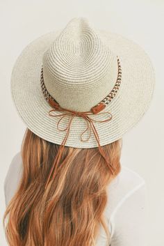 Add a touch of boho charm to your look with this stylish Straw Panama Fedora Hat! Quality crafted and accented with a Boho embroidered band, this hat is the perfect way to stay looking cool and on-trend. Plus, the suede tie accent gives it a unique touch! Material: 100% paper straw Circumference: 22" Brim length: 3.25" Straw Panama Hat, Wedding Wall Decorations, Lip Balm Holder, Toddler Socks, Wallet Organization, Judy Blue Jeans, Kids Hair Accessories, Tank Top Long Sleeve, Fedora Hat