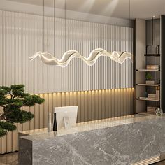 an office lobby with marble counter tops and white walls, along with a logo on the wall