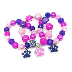 These adorable bracelets are the perfect favor for your little one's paw themed party! Each bracelet features a pink or purple enameled paw charm, resin rhinestone beads and an assortment of pink, purple and hot pink 10mm acrylic beads strung with durable stretch floss cord. Each bracelet comes individually packaged in organza bags. Please message me if you have any questions or if you would like to make some changes to this item. To be the first to know about new items, sales and giveaways, mar Personalized Pink Novelty Charm Bracelet, Personalized Pink Novelty Bracelets, Novelty Pink Stretch Bracelet For Birthday, Pink Novelty Stretch Bracelet For Birthday, Adjustable Purple Charm Bracelet For Birthday, Cute Pink Hypoallergenic Charm Bracelet, Pink Cute Hypoallergenic Charm Bracelet, Personalized Pink Novelty Stretch Bracelet, Playful Pink Charm Bracelet For Birthday