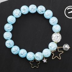 Light Blue Crystal Star Stretch Bracelet Brand New, Never Worn Metal: Zinc Alloy Fits All Blue Adjustable Charm Bracelet For Party, Adjustable Blue Charm Bracelet For Party, Adjustable Blue Charm Bracelet For Parties, Blue Charm Bracelet For Party, Blue Star-shaped Jewelry With Colorful Beads, Star-shaped Beaded Party Bracelets, Casual Star-shaped Jewelry For Parties, Blue Star Charm Bracelet, Trendy Blue Beaded Bracelets For Party