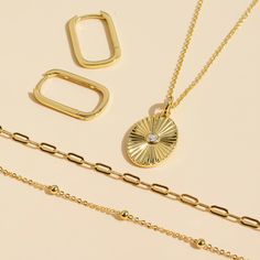 Our Gold Filled Oval Sun Necklace is an accessory that shines its way into your heart! With a 14k gold-filled hammered coin pendant, a beaded chain and a gorgeous round circumference of 16.2mm, this necklace adapts to you easily with its adjustable length. And don't worry about it getting wet or tarnished, because it's waterproof, hypoallergenic and resistant to corrosion - you can wear it fearlessly! - 14k gold-filled- Circle circumference: 16.2 mm. - Adjustable chain length: 16" + 2" extension Oval Coin Pendant Jewelry For Everyday, Gift Jewelry With Satellite Chain And Oval Link, Gift Satellite Chain Jewelry With Oval Link, Gift Oval Link Satellite Chain Jewelry, Everyday Oval Coin Pendant Jewelry, Oval Gold Plated Coin Pendant Jewelry, Gold Plated Oval Hammered Jewelry, Oval Gold Plated Hammered Jewelry, Oval Pendant Paperclip Chain Jewelry Gift