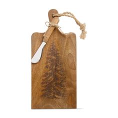 a wooden cutting board with a tree on it