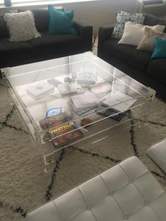 a living room with two couches and a coffee table