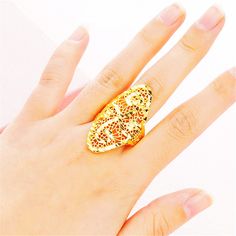 Add the shining touch of filigree to any finger with this bold and brilliant 18k gold-plated adjustable bypass ring. Face: 1.61" H 18k gold-plated copper Adjustable Gold Filigree Ring As Gift, Adjustable Gold Filigree Ring For Gifts, Gold Filigree Open Ring Gift, Gold Filigree Open Ring For Gifts, Bypass Ring, Jade Earrings, Jade Necklace, Jade Ring, Jade Bracelet