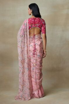 Flamingo pink silk organza saree handcrafted with floral, thread work of resham, beads and intricate dabka handwork embroidery. Comes with queen pink chamundi silk V-shaped padded blouse embroidered with diamond shaped sequins and floral embroidery. - Aza Fashions Pink Tissue Silk Blouse Piece For Reception, Pink Transitional Pre-draped Saree For Party, Transitional Season Pink Pre-draped Saree For Party, Pink Organza Blouse With Resham Embroidery, Silk Pre-draped Pink Saree For Reception, Pink Silk Pre-draped Saree For Reception, Pink Chanderi Blouse For Reception, Traditional Pink Organza Blouse Piece, Silk Pink Pre-draped Saree For Reception