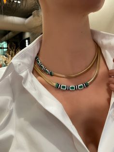 This ethereal necklace features 6.25 carats of vibrant green emeralds set in 18K yellow gold. Part of Nikos Koulis' Feelings Collection, this necklace strikes the ideal balance of delicate gold chain construction paired with exceptional stone work. Ultra-versatile this necklace can be worn as a wrap or draped and layered to make a bold statement. Steal the spotlight with this luminous piece, an instant signature for any occasion. Nikos Koulis, Perls Jewellery, Good Woman, Delicate Gold Chain, Elegant Jewellery, Colour Stone, Diamond Necklaces, Baguette Cut Diamond, Stone Work