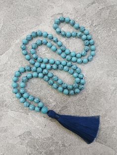 Turquoise Mala Necklace Turquoise Howlite 108 Mala Hand Knotted Mala Necklace Blue Tassel Mala Bead Yoga Gift Jewelry Prayer Beads Necklace  -  8mm  Turquoise Howlite 108 beads -  10 mm Howlite Guru bead -  9cm Blue tassel MY SHOP: https://www.etsy.com/shop/BonBonStones Please contact me with any questions. I'm happy to help! Blue 8mm Bead Jewelry For The Beach, Beach Jewelry With 8mm Blue Beads, Blue Beaded Jewelry For The Beach, Blue Beaded Jewelry For Beach, Adjustable Beaded Turquoise Necklace For Meditation, Turquoise Round Beads Necklace For Beach, Turquoise Necklace With Round Beads For Beach, Hand-strung Blue Necklaces For The Beach, Blue Hand-strung Necklaces For Beach