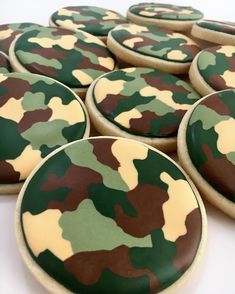 cookies decorated with green and brown camouflage print