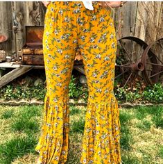 Gypsy Junkies Brand Nwt Bell Pants Size: Med/Large Please Note That The Inside Label Says Med/Large But Listing Is Under Large For Easier Product Search Color: Mustard Yellow/Multi Floral Amazing Vibrant Colors These Are So Adorable With A Front Tie Shirt Amagine Taking An Evening Walk On The Beach In These Cute Pants Hippie Style Wide Leg Floral Print Pants, Hippie Style Floral Print Wide Leg Pants, Bohemian Trousers For Fall, Bohemian Full Length Pants For Fall, Hippie Wide Leg Bottoms With Floral Print, Hippie Flare Bottoms For Spring, Hippie Wide Leg Floral Print Bottoms, Hippie Style Flared Bottoms For Spring, Hippie Wide-leg Bottoms With Floral Print