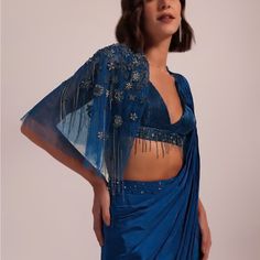 This Designer Piece Was Custom Made Wore It Once In A Reception Party For 2 Hrs It Is Padded Blouse . It Is Size Medium Which Is 34-36. Super Comfortable And Elegant Piece . Festive Blue Pre-draped Saree For Evening, Blue Hand Embellished Pre-draped Saree For Festive Occasions, Traditional V-neck Pre-draped Saree For Parties, Blue Hand-embellished Pre-draped Saree, Party Pre-draped V-neck Saree With Unstitched Blouse, Party V-neck Pre-draped Saree With Unstitched Blouse, Party V-neck Pre-draped Saree With Blouse Piece, Fitted Blue Pre-draped Saree For Festive Occasions, Traditional Blue Blouse Piece For Evening