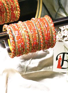 Traditional Indian Red Chooda Bangles in USA Cheap Red Bangle For Wedding, Bohemian Beaded Bangle Bracelet For Wedding, Red Hand Set Bangle For Festivals, Hand Set Red Bangle For Festivals, Red Zari Work Bracelet For Diwali, Red Kundan Bangle With Zari Work, Red Tilla Bracelet For Festivals, Red Zari Work Bracelets For Festive Season, Red Zari Work Bangle Bracelets