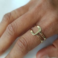 14K solid gold ring in a minimalist style for lovers of geometric shapes. ◈ DETAILS Weight: 3g Width upper part-9mm / 0.35'' Thickness-1.3 mm / 0.05'' ◈ MATERIAL 14K Solid Gold - Smooth,shiny,plain surface ◈ ALSO AVAILABLE IN 14K/18K/9K Yellow, Rose, or White Gold ◈ ENGRAVING is optional ◈ SHIPPING is insured express and free worldwide ◈ GIFT WRAPPING is included with every purchase ✧ Back to my shop for more handcrafted gold jewelry: https://etsy.me/38Cs5Zl If you have any questions, I will be Modern Everyday Stackable Rings With Open Band, Minimalist Recycled Gold Stackable Toe Rings, Minimalist Recycled Gold Open Band Ring, Modern Gold Stackable Initial Ring, Minimalist Stackable Rings With Open Band In Recycled Gold, Modern Stackable Rings As A Gift, Modern Stackable Rings As Gift, Modern Stackable Toe Rings For Gifts, Modern Stackable Rings