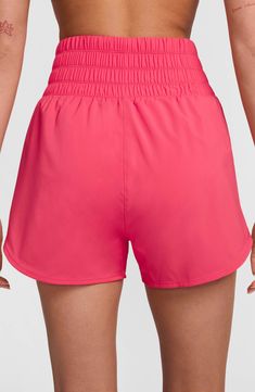 Gear up for your run with these lightweight high-waisted shorts constructed from moisture-wicking fabric and designed with brief lining for extra support. 3" inseam; 26" leg opening; 13 1/2" front rise; 17" back rise (size Medium) Elastic waist Side-seam pockets Dri-FIT moisture-wicking technology Brief liner 100% polyester Machine wash, tumble dry Imported Nike Athletic Shorts With Built-in Shorts And 4-way Stretch, Nike Athletic Shorts With Elastic Waistband For Gym, Nike Athletic Shorts With 4-way Stretch And Built-in Shorts, Nike Nylon Running Shorts, Nike Functional Activewear With Elastic Waistband, Go-dry Nylon High-waisted Athletic Shorts, Nike Running Nylon Shorts, Nike Activewear With Built-in Shorts For Summer, Nike Running Shorts Athleisure Style