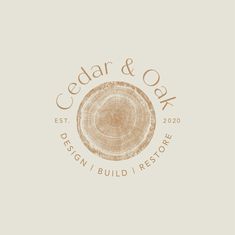 the logo for cedar & oak design and build restores, which has been designed to look like a tree stump