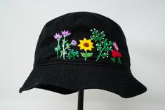 Item: mushroom embroidered bucket hat Material: 100% cotton Size: one size fits most Embroidery: hand made with acrylic thread Free first class shipping, upgradable priority mail service. 30 days return policy, feel confident at your purchase! Custom Embroidered Summer Hats With Adjustable Fit, Handmade Adjustable Bucket Hat For Spring, Custom Embroidered Cotton Hats For Summer, Custom Embroidered Cotton Summer Hats, Spring Wide Brim Bucket Hat With Embroidered Logo, Embroidered Brimmed Bucket Hat For Spring, Embroidered Brimmed Bucket Hat For Summer, Embroidered Bucket Hat For Spring, Summer Bucket Hat With Embroidered Logo