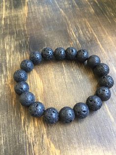 "Lava Rock beaded bracelet, 8mm beads, elastic Average bracelet size for women in 7\" and for men 8\" printable ruler - https://printable-ruler.net/ Add 1/4 inch to 1 inch (average is 1/2 inch) to your wrist size, depending on whether you would like a snug, comfort, or loose fit. Unisex Jewelry LAVA ROCK BEADS Since lava is known for its grounding qualities, it's wonderful for calming the emotions. In fact, the quality of fire springs from the ground, so in terms of healing gems, this lends itse Printable Ruler, Lava Rock, Geek Gifts, Lava Bead, Unisex Bracelets, Lava Stone, Unisex Jewelry, Agate Beads, Bracelet Sizes