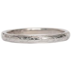 an antique wedding ring in white gold