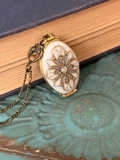 For yourself or someone you love... Timeless and classic, this gorgeous Antique brass filigree locket will become a special addition to your jewelry collection. The locket opens to the side to reveal 4 places, Glue on photos or keep a secret note locked away, close to your heart. SIZE: Oval locket: approx 32mmx20mm You can select a LENGTH you like! I also have another vintage silver locket with dragonfly here: https://www.etsy.com/listing/173498129/ Happy customers said this: AMAZING! The photo Elegant Handmade Antique Gold Locket Necklace, Nickel-free Brass Locket Necklace For Wedding, Antique Gold Locket Necklace With Vintage Charm, Antique Gold Locket Necklace Gift, Antique Gold Victorian Jewelry Gift, Victorian Antique Gold Jewelry For Gift, Victorian Antique Gold Jewelry Gift, Ornate Medallion Locket Necklace With Vintage Charm, Nickel-free Bronze Locket Necklace As Gift