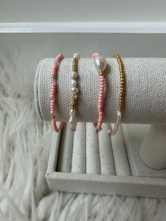 consists of pearls, gold and pink seed beads Rose Gold Beaded Bracelets With Pearl Charm, Pink Dainty Pearl Bracelet, Pearl Beaded Bracelets With Gold And Round Beads, Pink Pearl Bracelet With Tiny Round Beads, Pink Pearl Jewelry With Tiny Beads, Rose Gold Pearl Beaded Bracelets With Round Beads, Dainty Pink Pearl Bracelets, Beaded Pink Gold Bracelets, Pink Pearl Beaded Bracelets For Jewelry Making