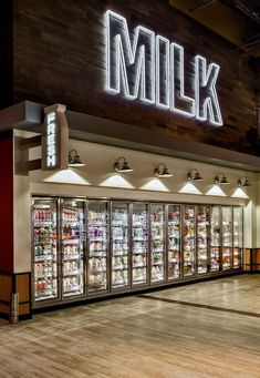 an empty grocery store with the lights on