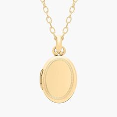 Carry loved ones close with this premium oval locket crafted in 14k yellow gold that opens with a snap clasp to present two photos. Suspended from a forzatina chain necklace, this substantial locket can be engraved on the front for a personalized gift. Classic Oval Locket Necklace Stamped 14k, Dainty Gold Oval Locket Necklace, Dainty Oval Yellow Gold Jewelry, 14k Gold Oval Link Locket Jewelry, Yellow Gold Locket Necklace With Oval Pendant, 14k Gold Oval Pendant Locket Necklace, Dainty Oval Locket Necklace For Anniversary, Timeless Gold Oval Locket Necklace, Classic Yellow Gold Locket Necklace With Oval Link