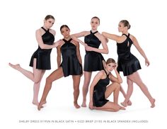 a group of women in black dresses posing for the camera