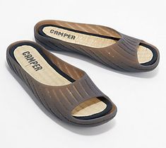 Sleek, simple, and oh-so-comfy, these slide sandals are ready for those relaxing evenings on the deck, hot summer days by the pool, and weekend trips to the beach. From Camper. Casual Summer Mules With Rubber Sole, Summer Outdoor Slippers With Rubber Sole, Comfortable Slip-on Jelly Sandals For Beach, Outdoor Summer Slippers With Rubber Sole, Comfortable Beach Slide Jelly Sandals, Poolside Slip-on Sandals With Textured Footbed, Comfortable Jelly Sandals For Summer Beach, Comfortable Jelly Sandals For Beach Season, Open Toe Slides For Outdoor Beach Season