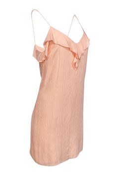 This romantic slip-style dress from Rag & Bone will be your go-to summer garment. With flounce detail on a V-neckline and spaghetti straps, it’s the perfect combination of playfulness and sultriness. A peach color will keep your whole ensemble light looking and airy, so throw on some strappy heels and call it a day. Size 2 100% Triacetate Lined Slip on V-neckline Strappy Flounce neckline Bust 34” Waist 34” Shoulder to hem 35.5” Feminine Sleeveless Slip Dress For Summer, Summer Mini Dress With Delicate Straps For Brunch, Feminine Sleeveless Slip Dress For Vacation, Feminine Summer Dresses With Adjustable Straps, Spring Peach Dress With Spaghetti Straps, Summer Dresses With Delicate Ruffled Straps, Peach Sleeveless Sundress For Brunch, Summer Ruffled Cami Dress, Spring Cami Mini Dress With Ruffles