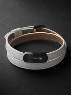 Messika's bracelet features the brand's 'Move' signature, the charm embedded in the plaque glides freely as your wrist sways. It's crafted from leather with DLC-coated titanium hardware. Each Messika piece comes with a two-year warranty, which is activated 28 days after purchase. To receive an additional year's warranty, register your piece on Messika's website. Leather Bracelet For Men, Leather Bracelets Women, Mens Watches Leather, Latest Watches, Titanium Bracelet, Wrist Wear, White Bracelets, Gorgeous Leather, Mens Leather Bracelet