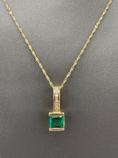 "BEAUTIFUL EMERALD AND DIAMOND NECKLACE 2.00 Carat Princess Cut Emerald, Set In 14KT Yellow Gold Accented With 3 Round White Diamonds. Includes 14KT Yellow Gold 18\" Chain. This Is A Real Stunner! For The Most Discerning Neck, Feel Like A Princess. Total Weight In Gold = 9.17 Grams Our Price $1595.00 Regularly Priced At $2500.00  Please See Our Video  Remember - whether you're purchasing for yourself or a gift for a loved one, Buy With Confidence!  We Guarantee Everything We Sell!  SKU # N408" Panna Ring, Emerald Diamond Necklace, Gold Coin Jewelry, Emerald And Diamond Necklace, Emerald Jewellery, Amethyst Bangle, Emerald Set, Pendant Ideas, Diamond Pendent