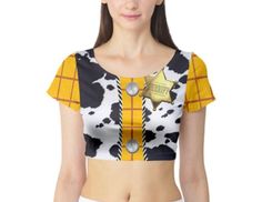 "*PLEASE PLACE ORDERS BY SEPTEMBER 20TH FOR GUARANTEED HALLOWEEN DELIVERY* Sublimation printed crop top great for a disneybound, halloween costume or everyday wear! This design is printed using a sublimation printer, meaning the design is dyed into the fabric, making the design last longer than traditionally printed shirts. Printed on a 100% cotton crop top in sizes XS-3XL. **PLEASE CHECK SIZE CHART IN THIRD PHOTO FOR MEASUREMENTS BEFORE ORDERING** **Current photo is a digital rendering. Actual Halloween Fitted Crop Top, Trendy Halloween Cosplay Tops, Fitted Graphic Print Tops For Costume Party, Fitted Short Sleeve Themed Tops, Fitted Cropped Top For Halloween, Fitted Short Sleeve Tops For Cosplay, Halloween Cosplay Fitted Crop Top, Fitted Halloween Crop Top, Fitted Crop Top For Halloween Cosplay