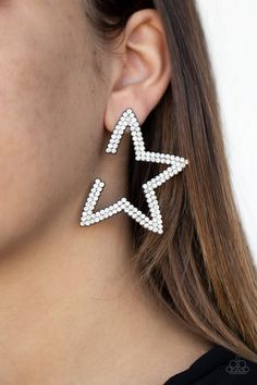 Encrusted in two rows of smoky hematite rhinestones, a gunmetal star frame dots the ear for a stellar shimmer. To flatter the natural contour of the face, one side angle of the star frame is intentionally left open. Earring attaches to a standard post fitting. Side Angle, Natural Contour, Crystal Stars, Paparazzi Accessories, White Rhinestone, Dangly Earrings, Black Earrings, Paparazzi Jewelry, Affordable Jewelry