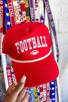 Final Sale A classic red trucker hat with a white rope detail and minimalistic white graphic. This style is perfect for all fans and can be worn on gameday or any other day of the week. • Made in United States Red Trucker Hat With Letter Print For Sports, Red Cotton Trucker Hat For Sports, Sporty Red Snapback Hat For Game Day, Red Snapback Trucker Hat For Game Day, Adjustable Team-colored Trucker Hat For Game Day, White Rope, Egift Card, Trucker Hat, Football