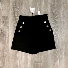 These Shorts Feature A 3 Gold Button Detail On Each Side, Faux Pockets, Back Welt Pocket, Side Seam Zipper, And High Waist. Measurements Waist - 12” Rise - 13” Length- 4” Color - Black Size - Xsmall Condition - Nwt Chic High-waisted Button Closure Shorts, Elegant High-waisted Shorts With Button Closure, Elegant High Waist Shorts With Button Closure, Elegant Short Bottoms With Button Closure, Chic High-waisted Shorts With Button Closure, High Rise Bottoms With Button Closure For Night Out, High Rise Button Closure Night Out Bottoms, High Rise Button Closure Bottoms For Night Out, Chic Fitted Shorts With Button Closure