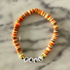 Fall Friendship Bracelet. This Beautiful Jewelry Piece Can Be Worn To Football Games, Fall Parties And Many More Places. Fall Bracelet Colors Ideas, Fall Color Bracelets, Thanksgiving Bracelet Ideas, Fall Friendship Bracelets, Bracelet Pony Beads, Fall Bracelet Ideas, Thanksgiving Bracelet, Bracelet Combos, Fall Bracelets