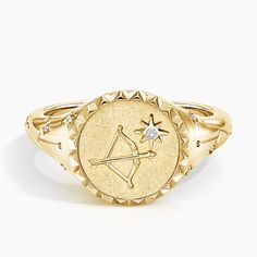 Sagittarius Zodiac Diamond Signet Ring - 14K Yellow Gold. An embossed centaur and a starlike diamond empower this signet and its wearer with the characteristics of the Zodiac fire sign Sagittarius - free-spirited, adventurous, spontaneous. 
 
 An impression in the symbolic shape of the Sagittarius sign is carved into the textured back side of the signet itself, while a shimmering constellation is formed with diamonds along either side of the design. 

Sol is a collection that invites you to embr Gold Zodiac Sign Rings As Gift, Sagittarius Signet Ring, Yellow Gold Zodiac Sign Jewelry, Luxury Gold-plated Zodiac Sign Jewelry, Gold Plated Zodiac Sign Pendant Jewelry, Sagittarius Sign, Diamond Signet Ring, Zodiac Sagittarius, Detailed Ring