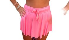 High waisted mini athletic skort with shorts underneath. Skirt is higher on the sides and lower in the back for more coverage. Barbie Pink color. Chic Summer Tennis Skirt With Built-in Shorts, Spring Cheerleading Skort With Built-in Shorts, High Waist Shorts For Cheerleading In Summer, Casual Short Tennis Skirt With Built-in Shorts, Mini Skort With Built-in Shorts For Vacation, Cheerleading Mini Skirt Bottoms With Built-in Shorts, Casual Mini Swim Skirt With Built-in Shorts, Trendy Pink Skort With Built-in Shorts, Day Out Tennis Skirt With Built-in Shorts