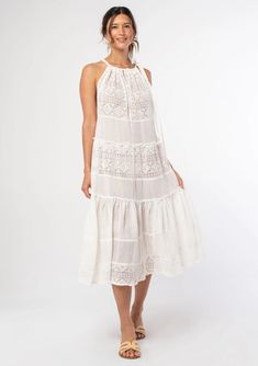 White colored Cotton Swim Cover-up. With embroider and lace print detailing. Airy Flowy Dress For Beach Cover-up, Breezy Sleeveless Beach Dress For Beach Wedding, Sleeveless Breezy Beach Dress For Beach Wedding, Breezy Sleeveless Beach Dress For Wedding, Flowy Boho Dress With Lace Trim For Beach, Sleeveless Breezy Dress For Beach Wedding, Beach Season Lace Dress With Lace Trim, Beach Season Lace Dresses With Lace Trim, Lace Trim Beach Cover-up Dress