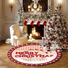 a living room decorated for christmas with fireplace