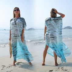 Aquafarbenes Strandkleid für stilvolle Strandliebhaber

 Wir stellen Ihnen das Aqua Beach Dress vor, das perfekte Kleidungsstück für leidenschaftliche Meeresliebhaber, die am Strand ein modisches Statement setzen möchten. Hergestellt aus hochwertigen Materialien und so gestaltet, dass es Ihre natürliche Schönheit betont, vereint dieses Kleid mühelos Komfort und Stil. Egal, ob Sie an den Sandstränden spazieren gehen oder ein Abendessen am Strand genießen, dieses Kleid wird mit Sicherheit alle Bl Blue Breezy Summer Cover-up, Flowy Cover-up For Resort Season Vacation, Blue Flowy Cover-up For Beach Season, Summer Flowy Cover-up For Vacation, Flowy Beachy Swimwear For Summer, Flowy Summer Cover-up For Vacation, Beachy Flowy Swimwear For Summer, Flowy Summer Vacation Cover-up, Breezy Flowy Summer Cover-up