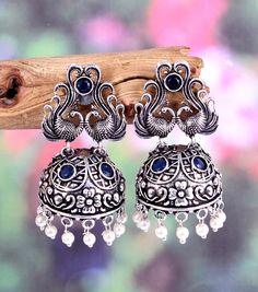 * Item  Description - * Material-  Silver plated Oxidised Earrings  * Weight -  28.00 Grams  * Inches -   2.0  Inches  * Length -  4.0 Centimeter  * Width -    2.0  centimeter  * Pattern -  Traditional wear, Party wear , Wedding gift, Daily wear, Casual Wear, birthday gift, anniversary gift ** Best price guaranteed ** We strive continuously to serve our customers better and keep updating our shop with new designs regularly .  We can also supply in wholesale quantities. To enquire about wholesale convo me .. Or e-mail at - hasnainansari198@gmail.com Please Contact Us for Bulk Orders. We will give you big discount on Bulk Quantity Orders.  To see more of our collection visit our shop  Seller Info: We are Aiming to supply best products to customers at best price. We believe good product nothi Silver Alloy Earrings For Wedding, Handmade Alloy Earrings For Party, Navratri Earrings For Pierced Ears, Oxidized Finish Jhumkas For Gift, Heavy Drop Earrings Jhumkas, Handmade Silver Alloy Earrings, Chandbali Danglers With Peacock Design, Gift Oxidized Finish Jhumkas, Heavy Drop Jhumkas