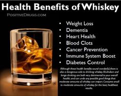 a glass of whiskey with ice cubes in it and the words health benefits of whiskey