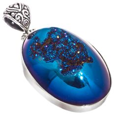 925 Sterling Silver Oval Cobalt Blue Titanium Druzy Agate Sterling Pendant, 1 7/8"    Bail Size:  4mm Silver Type:  Solid 925 Sterling silver Pendant Size:  47x25mm(1 7/8x1") incl bail Pendant Material:  Cobalt blue titanium druzy agate  Note:  No guesswork! You receive the actual piece pictured. Blue Oval Agate Jewelry, Blue Oval Pendant Jewelry With Polished Finish, Blue Oval Pendant With Polished Finish, Oval Blue Agate Jewelry, Blue Oval Cabochon Gemstones, Oval Blue Cabochon Gemstones, Blue Oval Cabochon Jewelry With Polished Finish, Blue Oval Cabochon Jewelry, Oval Blue Cabochon Jewelry