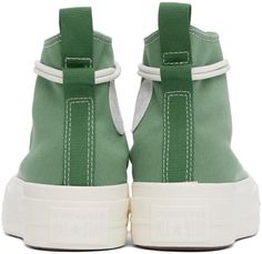 Converse.Green Chuck Taylor All Star Lift Platform Utility Sneakers.High-top bedford cord sneakers in green..· Rubber cap toe.· Wraparound lace-up closure.· Pull-tab at tongue.· Ripstop logo patch at inner side.· Eyelets at inner side.· Pull-loop at heel.· Cushioned Ortholite® insole.· Mesh lining.· Textured platform midsole.· Treaded rubber sole.· Platform: H1.75'.Supplier color: Herby/Egret/Admiral elm.Upper: textile. Sole: rubber..Made in Viet Nam..241799F127056 Sporty Green High-top Cotton Sneakers, Green Converse Sneakers With Rubber Toe Cap, Green Converse Cotton Sneakers, Green Cotton Converse Sneakers, Green High-top Canvas Sneakers With Vulcanized Sole, Green Canvas High-top Sneakers With Round Toe, Green Sporty Canvas High-top Sneakers, Sporty Green Canvas High-top Sneakers, Green Converse Sneakers With Laces