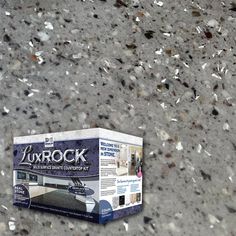 a box sitting on top of a cement floor