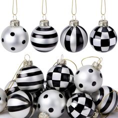 black and white ornaments are arranged in rows