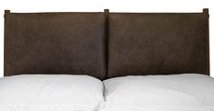 two brown headboards with white pillows on top of each one in front of a white background