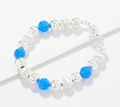 A little bit flashy, a little bit fun, this beaded bracelet pops with polished gemstone beads to complete the sleek style. From UltraFine® 950 Silver Nickel-Free Jewelry. Nickel Free Jewelry, Sleek Style, Blue Agate, Sleek Fashion, Magnetic Clasp, Gemstone Bracelet, Free Jewelry, Pandora Charm Bracelet, Round Beads